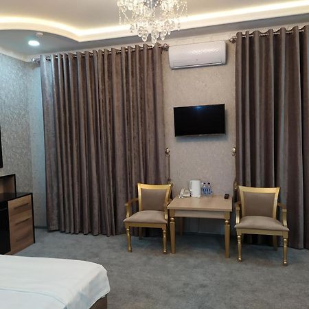 Diyor Hotel Marghilon Exterior photo