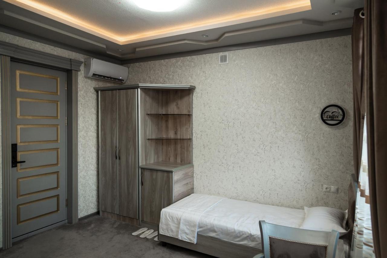 Diyor Hotel Marghilon Exterior photo
