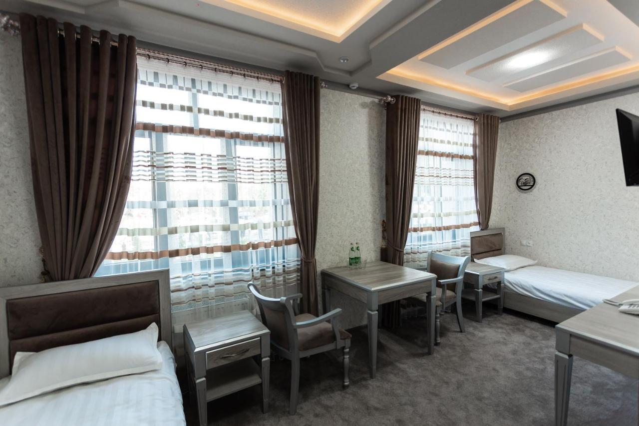 Diyor Hotel Marghilon Exterior photo