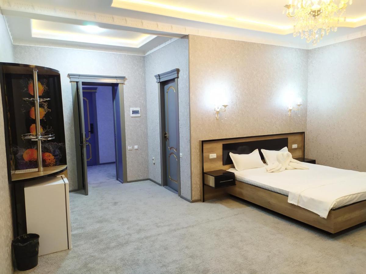 Diyor Hotel Marghilon Exterior photo