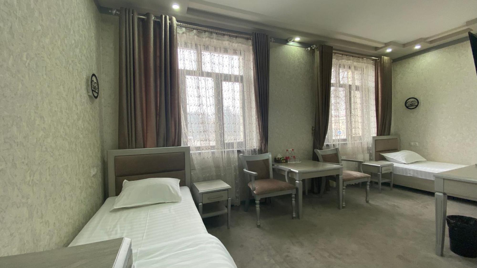 Diyor Hotel Marghilon Exterior photo