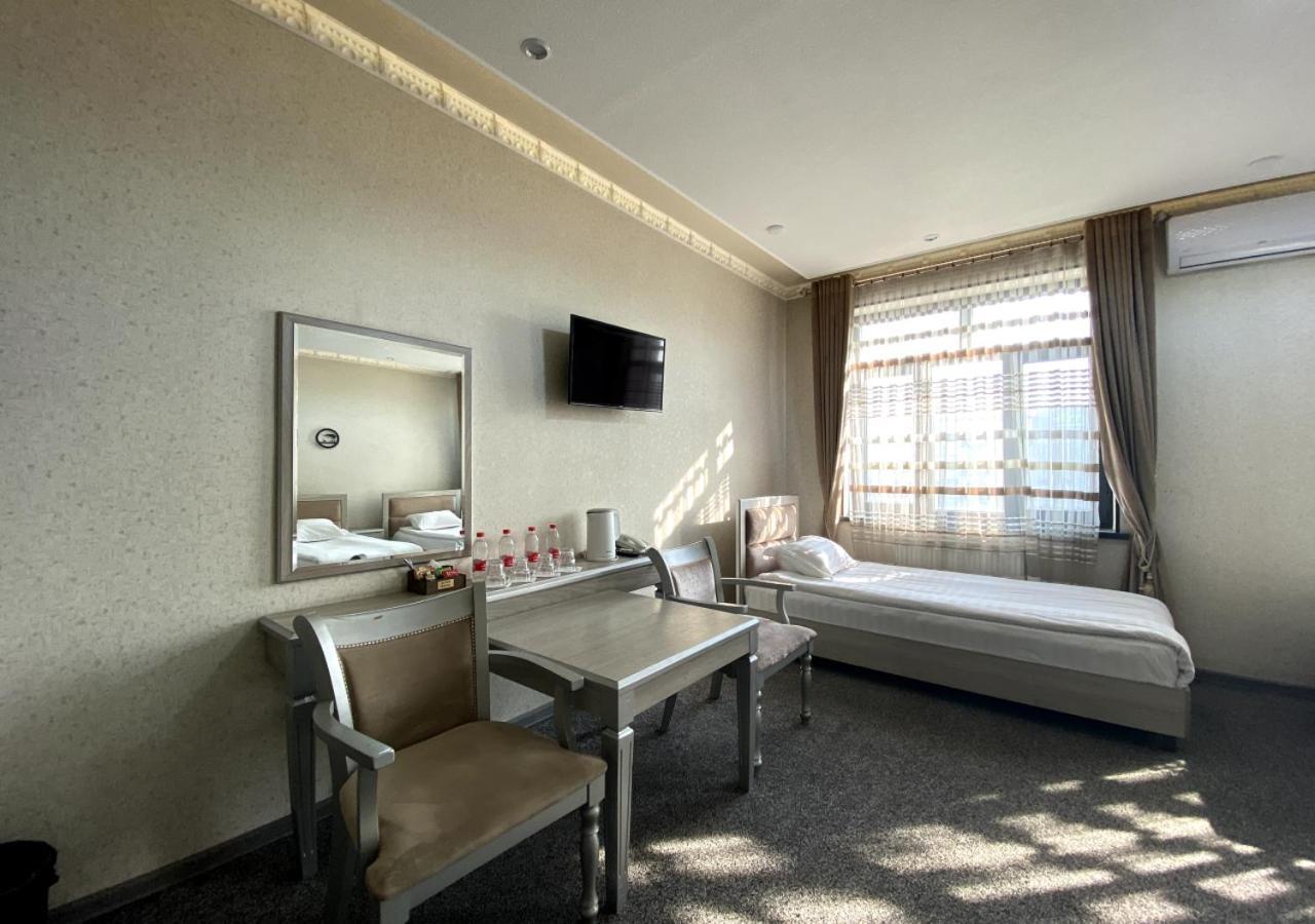 Diyor Hotel Marghilon Exterior photo