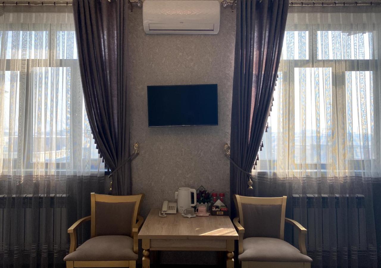 Diyor Hotel Marghilon Exterior photo
