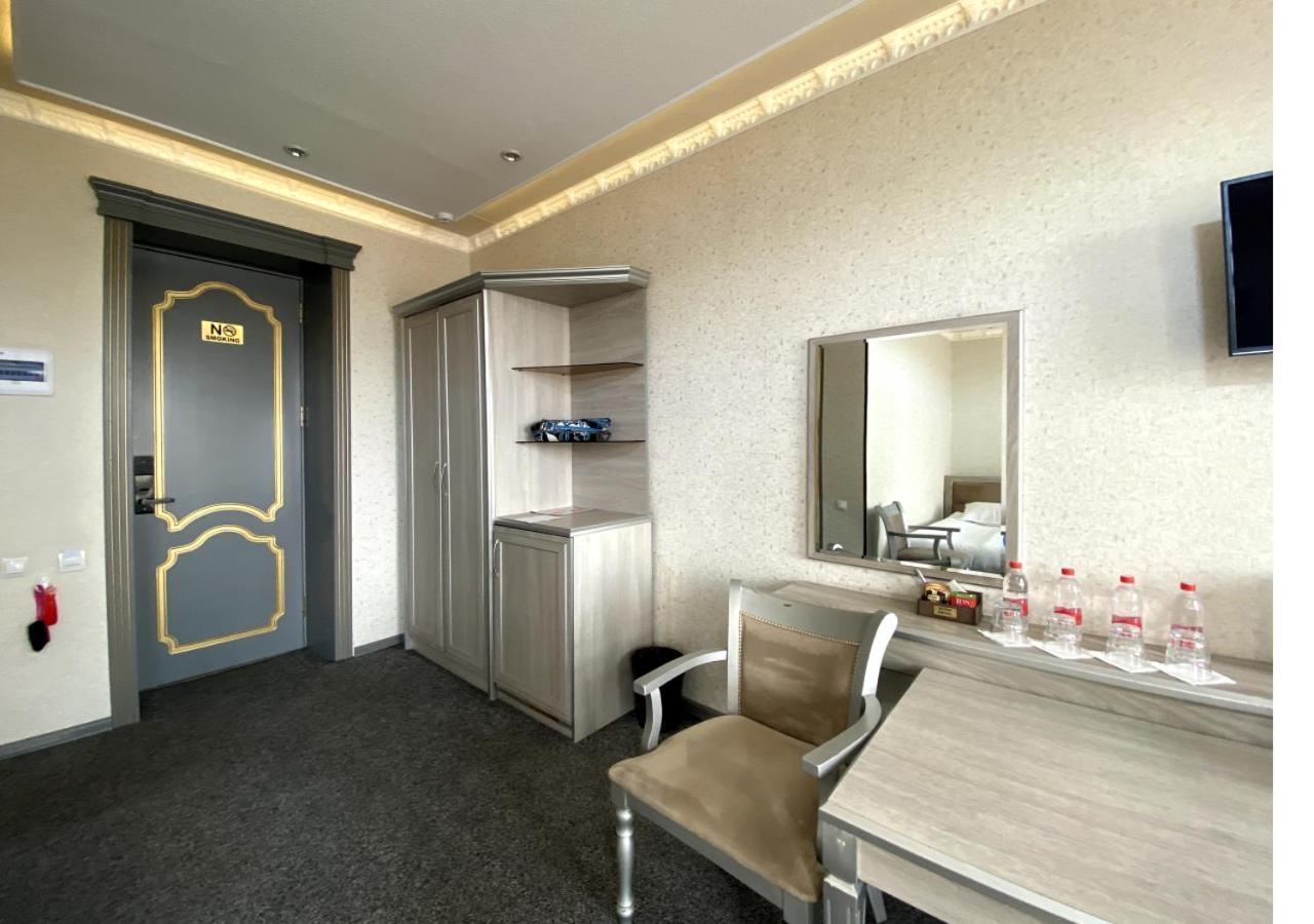 Diyor Hotel Marghilon Exterior photo
