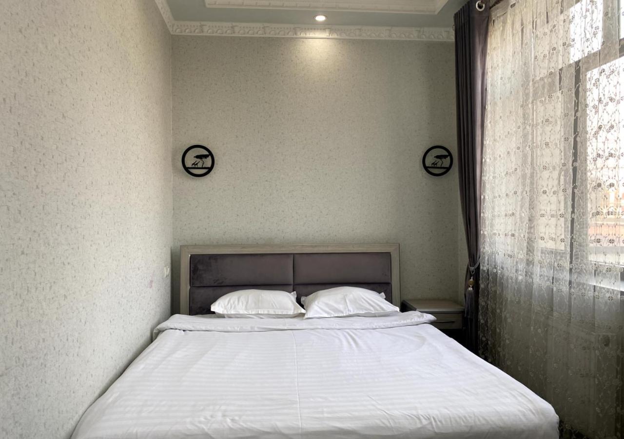 Diyor Hotel Marghilon Exterior photo