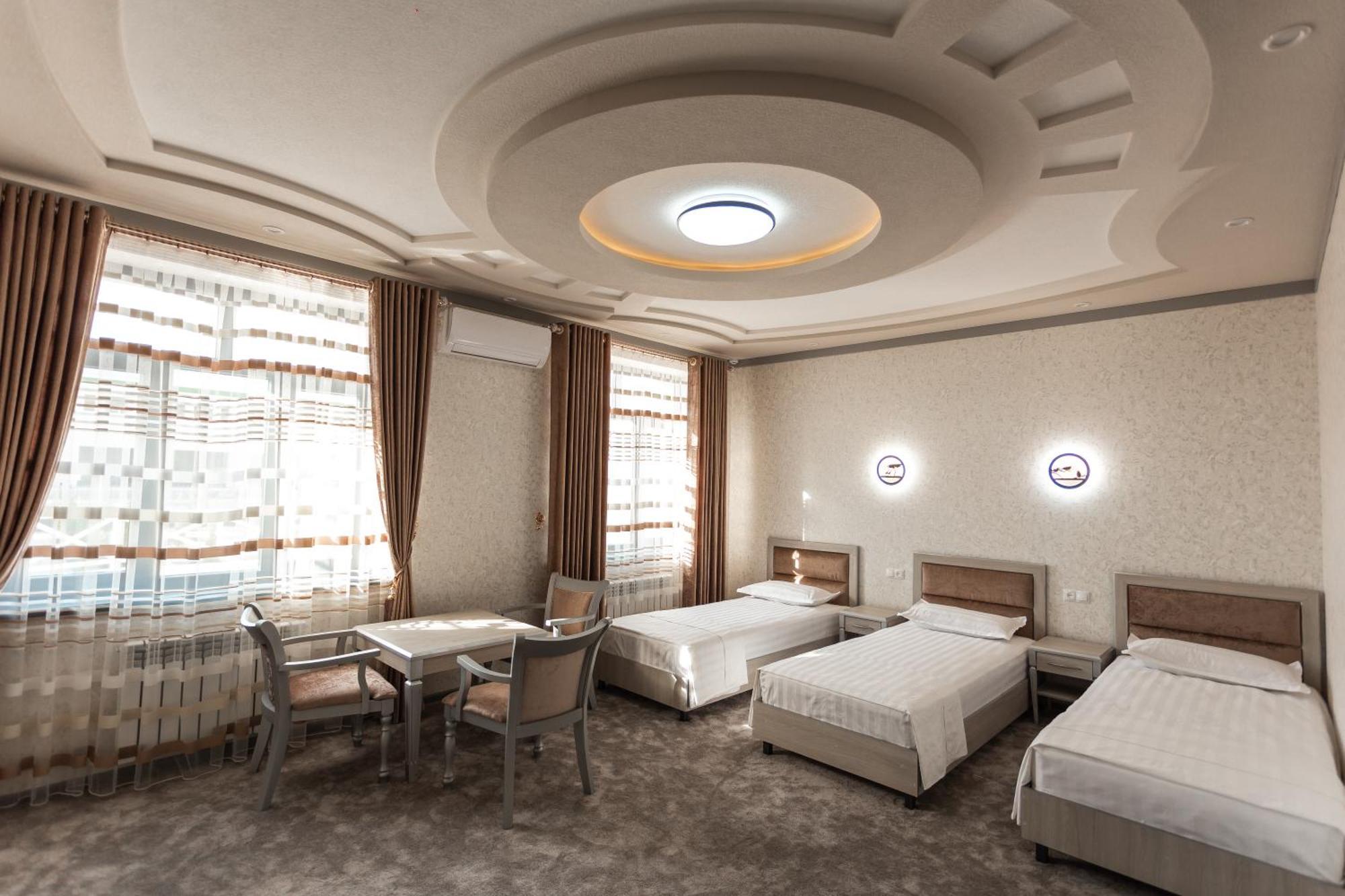Diyor Hotel Marghilon Exterior photo
