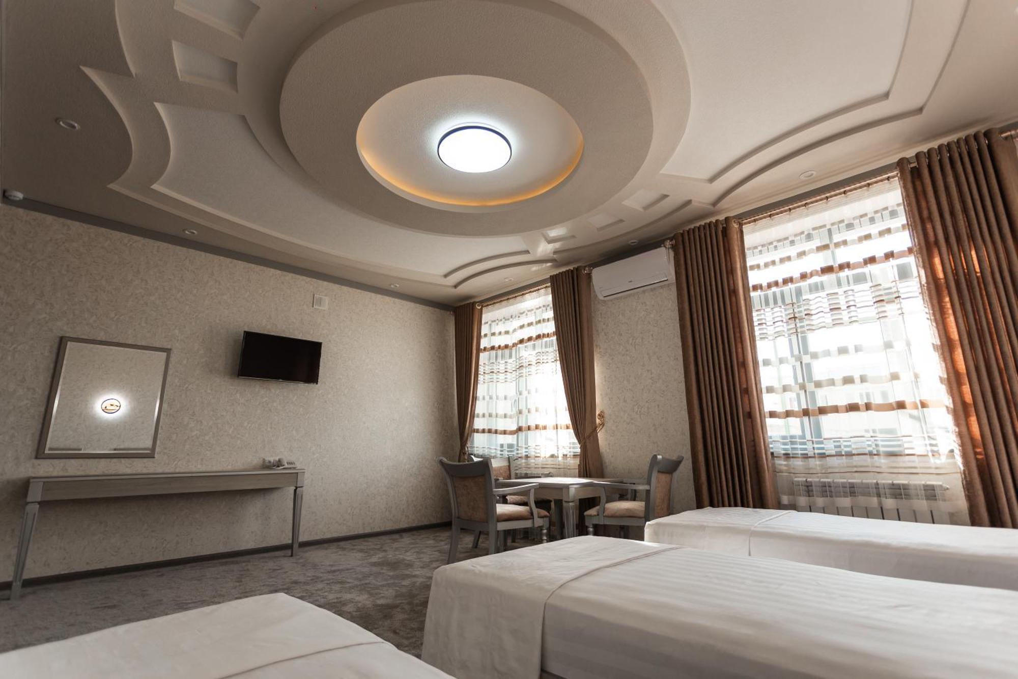 Diyor Hotel Marghilon Exterior photo