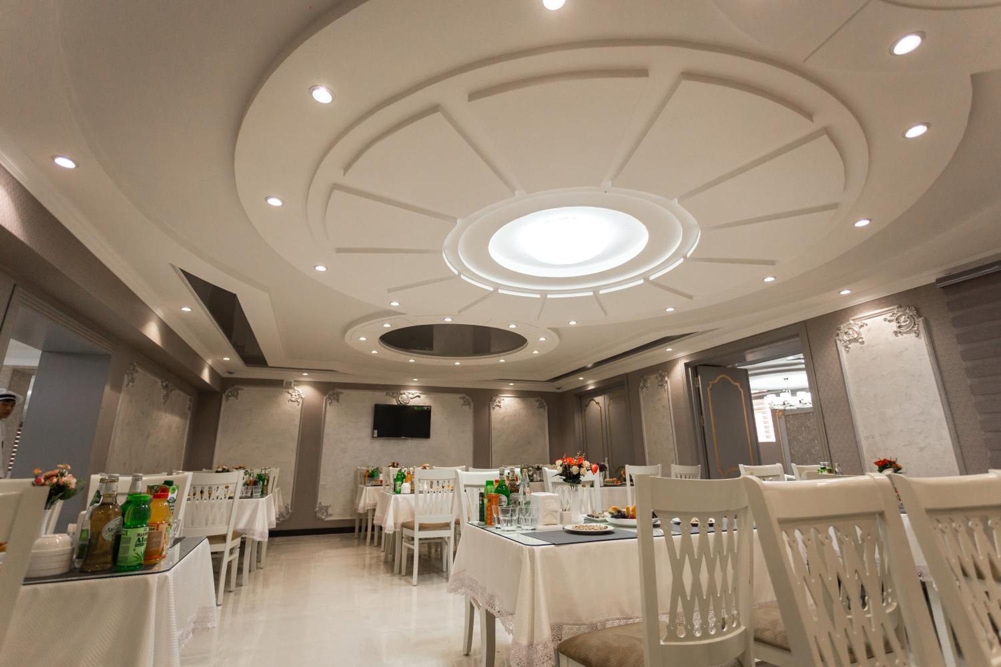 Diyor Hotel Marghilon Exterior photo