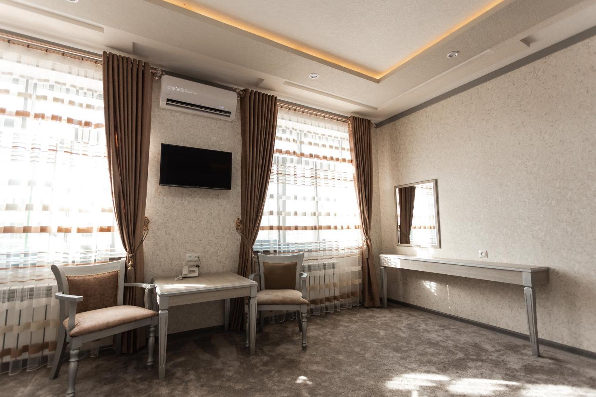 Diyor Hotel Marghilon Exterior photo
